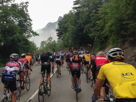 Climbing Alpe d'Huez with a hundred thousand others.