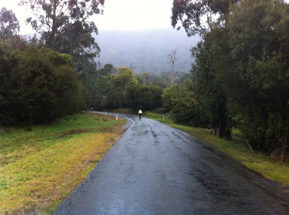 Climbing Don Road in the wet.