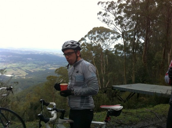 Brendan enjoying a cup of pumpkin soup with the Yarra Valley in the background.