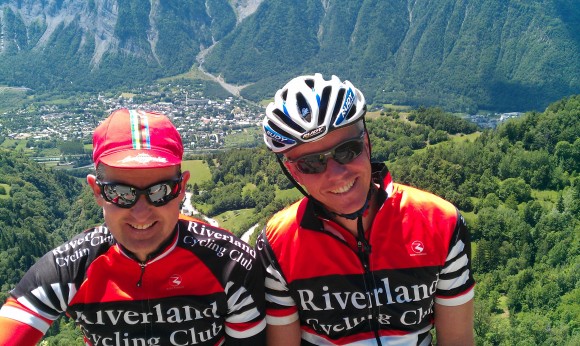Angus (right) and his mate Steve Jaensch are all-smiles after climbing Alpe d'Huez.