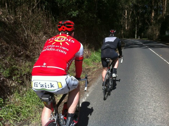Dougie (red) and Fletch (black) climb toward Olinda.