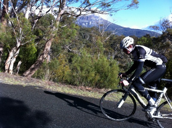 Dan taps away on the Waterworks climb with Mt. Wellington in the background.