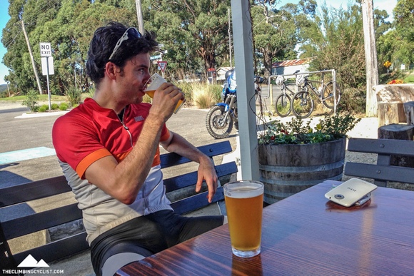 Nick enjoys a cold beverage  as we take a break between MTB sessions.